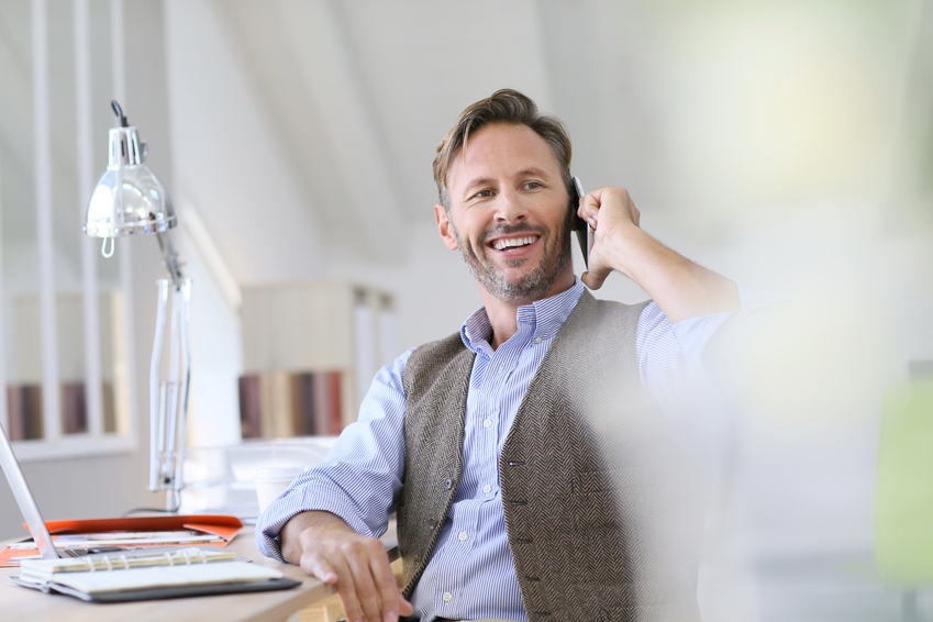 Businessman at work talking on the phone